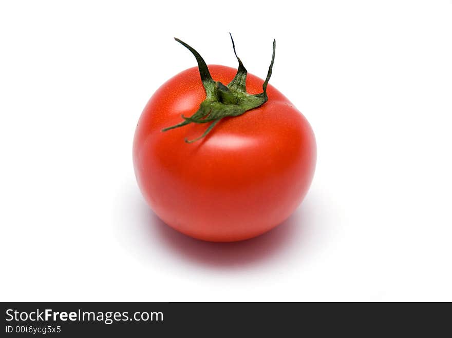 Juicy Isolated Tomato on the white background