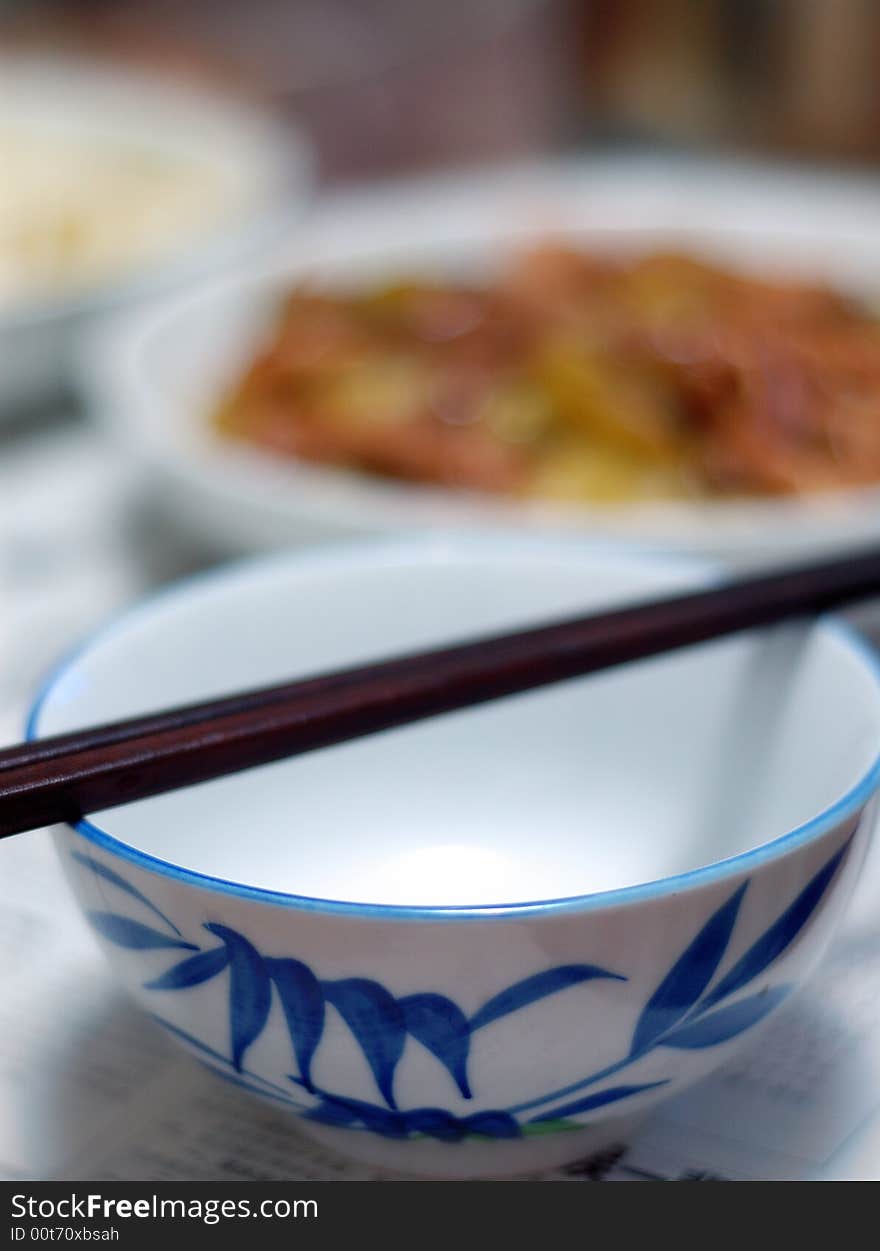 Chinese / Japanese Bowl and chopsticks. with chinese food. Chinese / Japanese Bowl and chopsticks. with chinese food