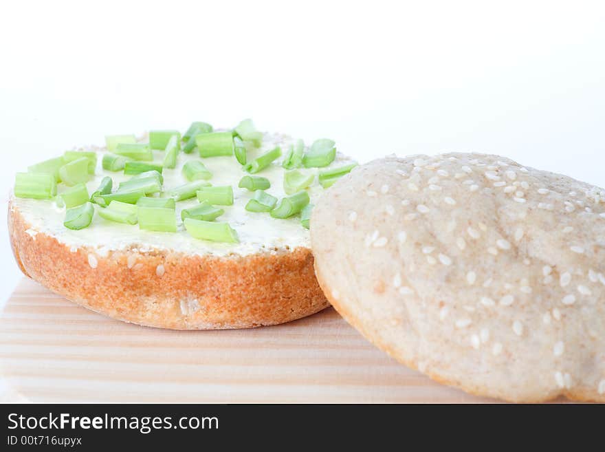 Baked roll with onion, isolated