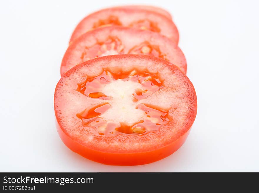 Red tomatoes on white background, isolated