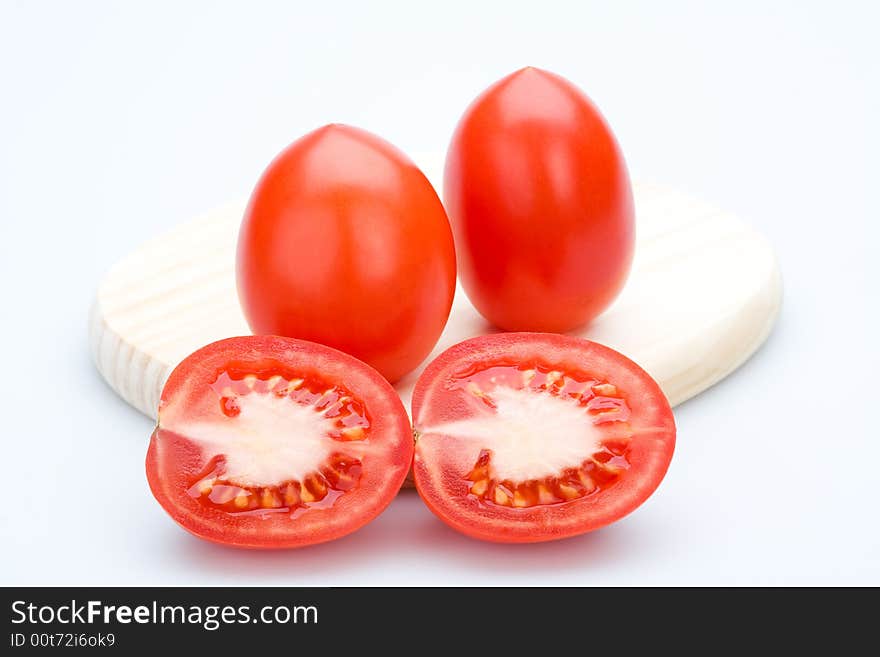 Red tomatoes on white background, isolated