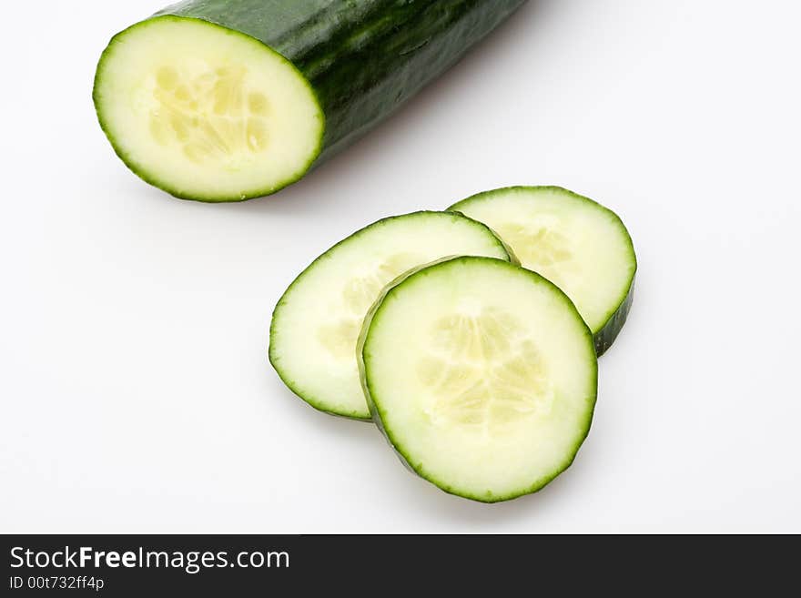 Sliced cucumber, isolated on white background