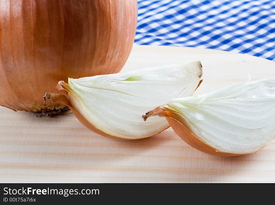 Two onions on a blue cloth