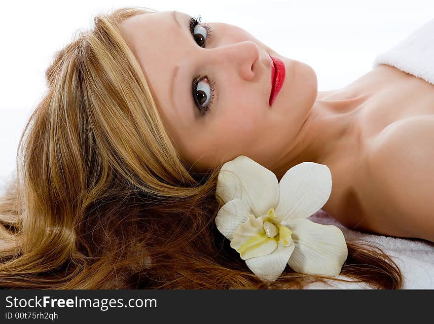 Attractive woman getting spa treatment on white