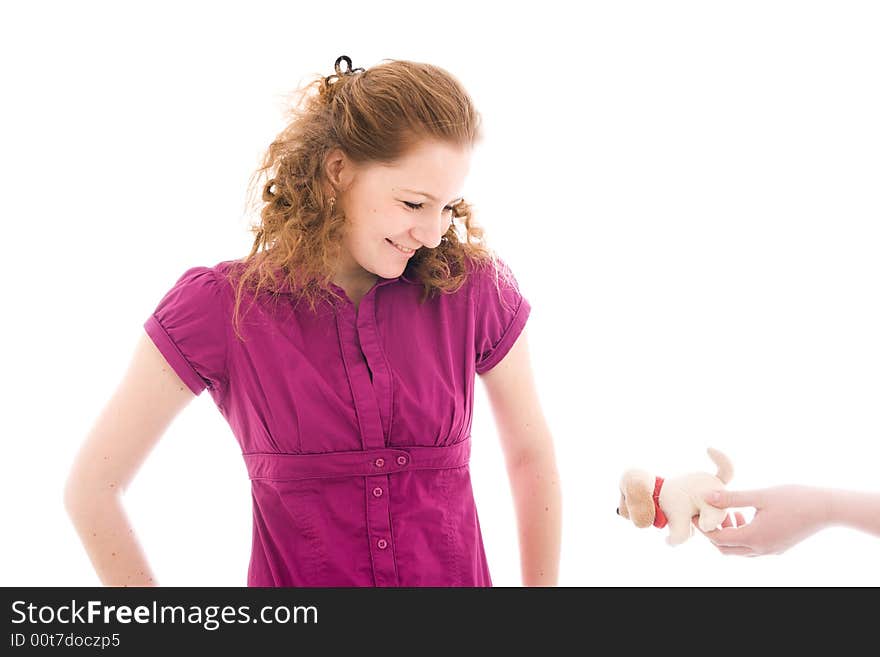 The young beautiful girl with a toy isolated on a white background