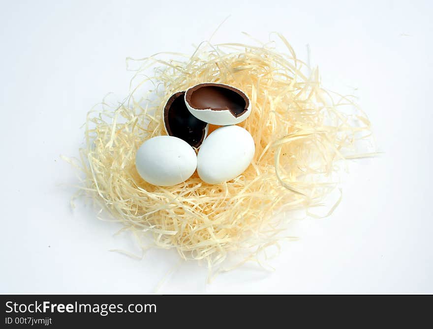 Realistic looking chocolate easter eggs in nest