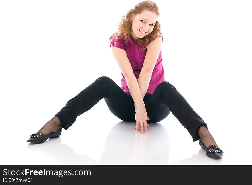 The young beautiful girl isolated on a white