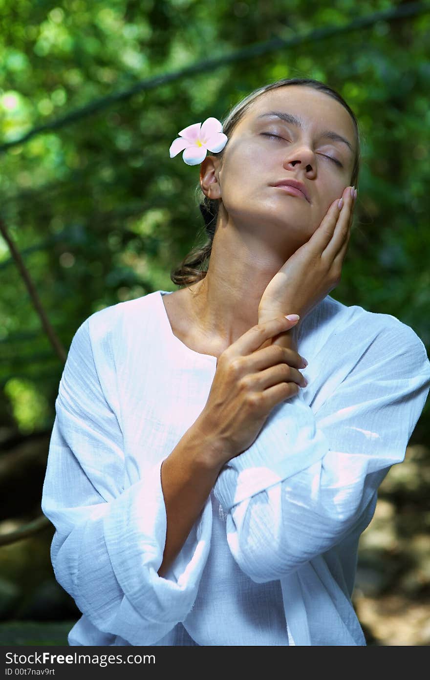 portrait of fresh and beautiful human with flower in summer environment. portrait of fresh and beautiful human with flower in summer environment