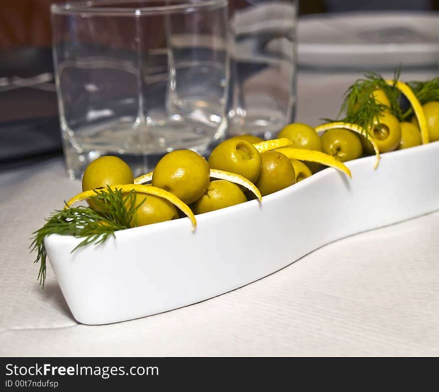 A collection of green olives like part of the mediterranea diet