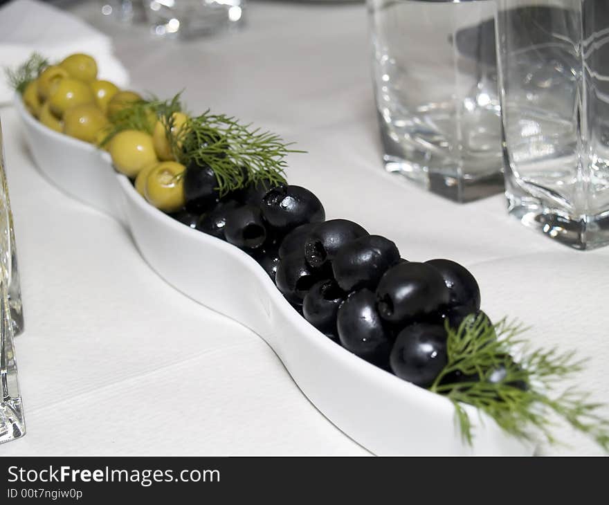 A collection of green and black olives like part of the mediterranea diet