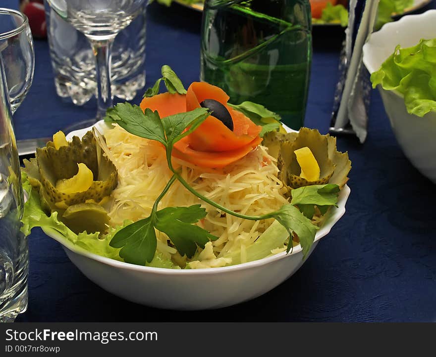 Beautifully served cheese salad on served table