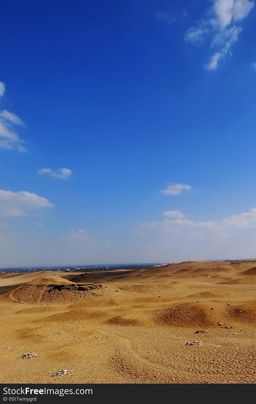 Orange sand on the desert and the blue sky in egypt