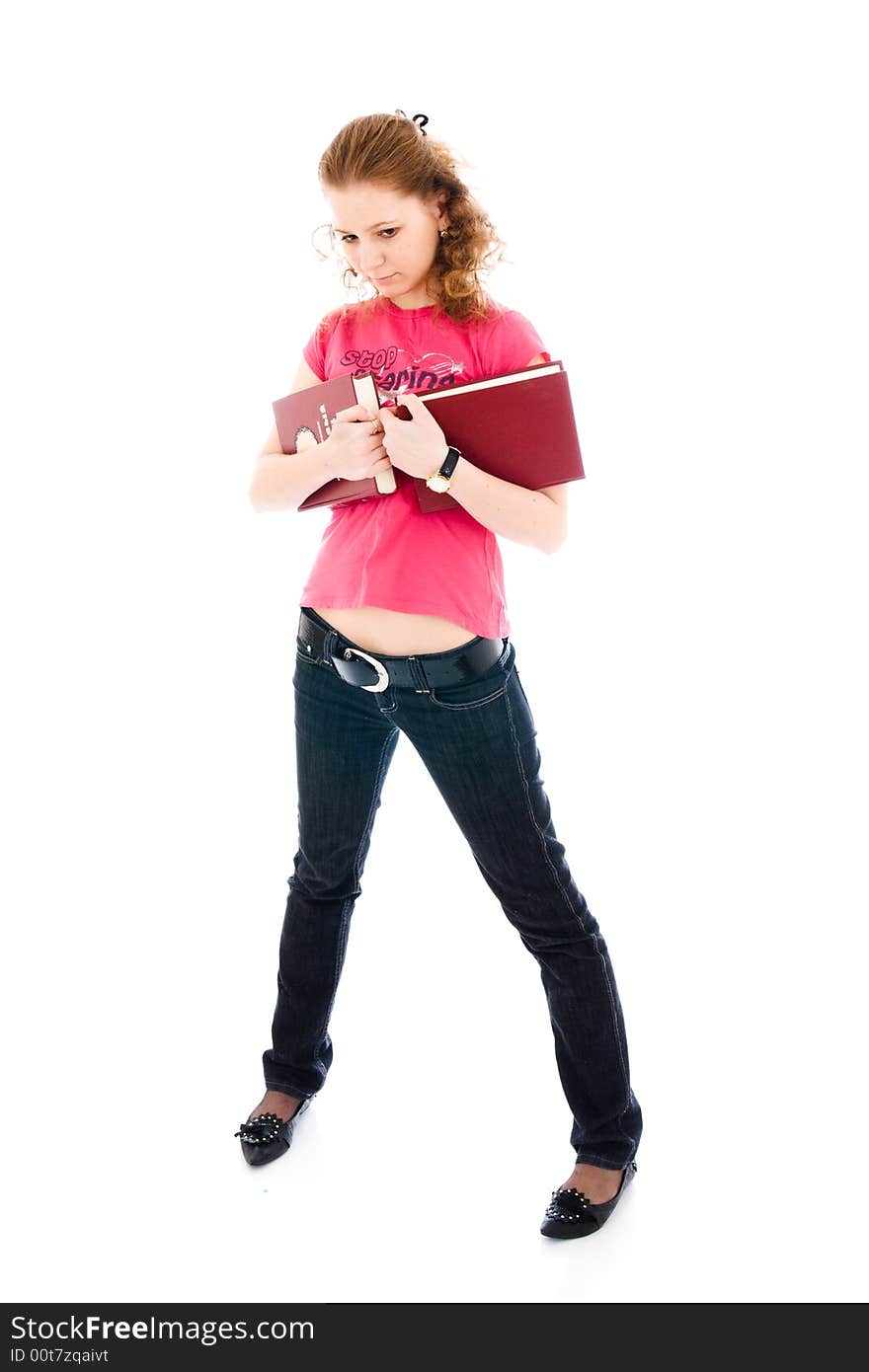 The young student with a books isolated on a white