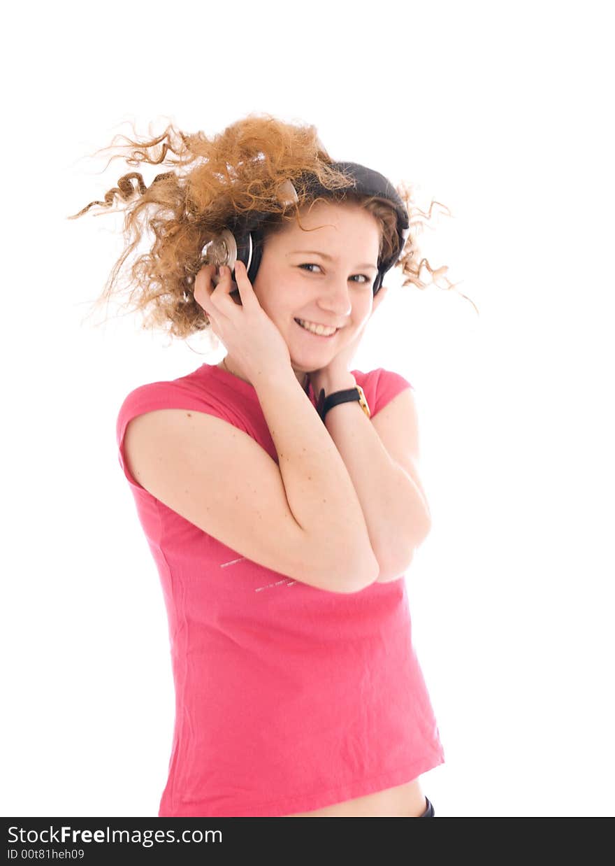 The young girl with a headphones isolated on a white background