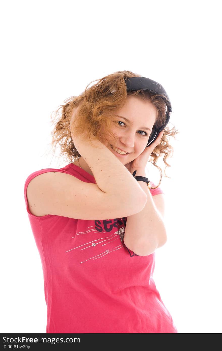 The young girl with a headphones isolated on a white background