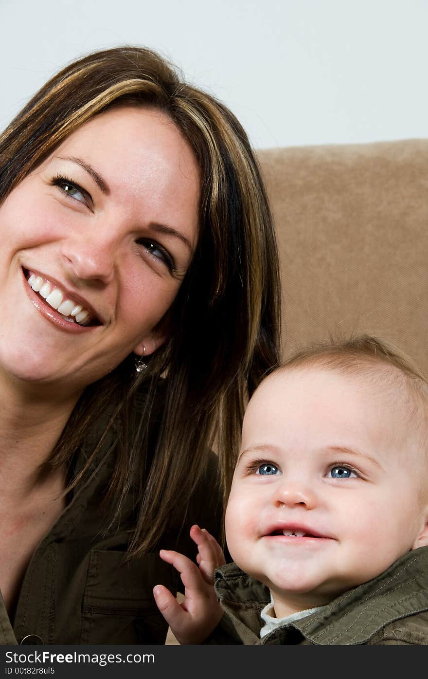 Mom happy with their baby boy blue eyes. Mom happy with their baby boy blue eyes