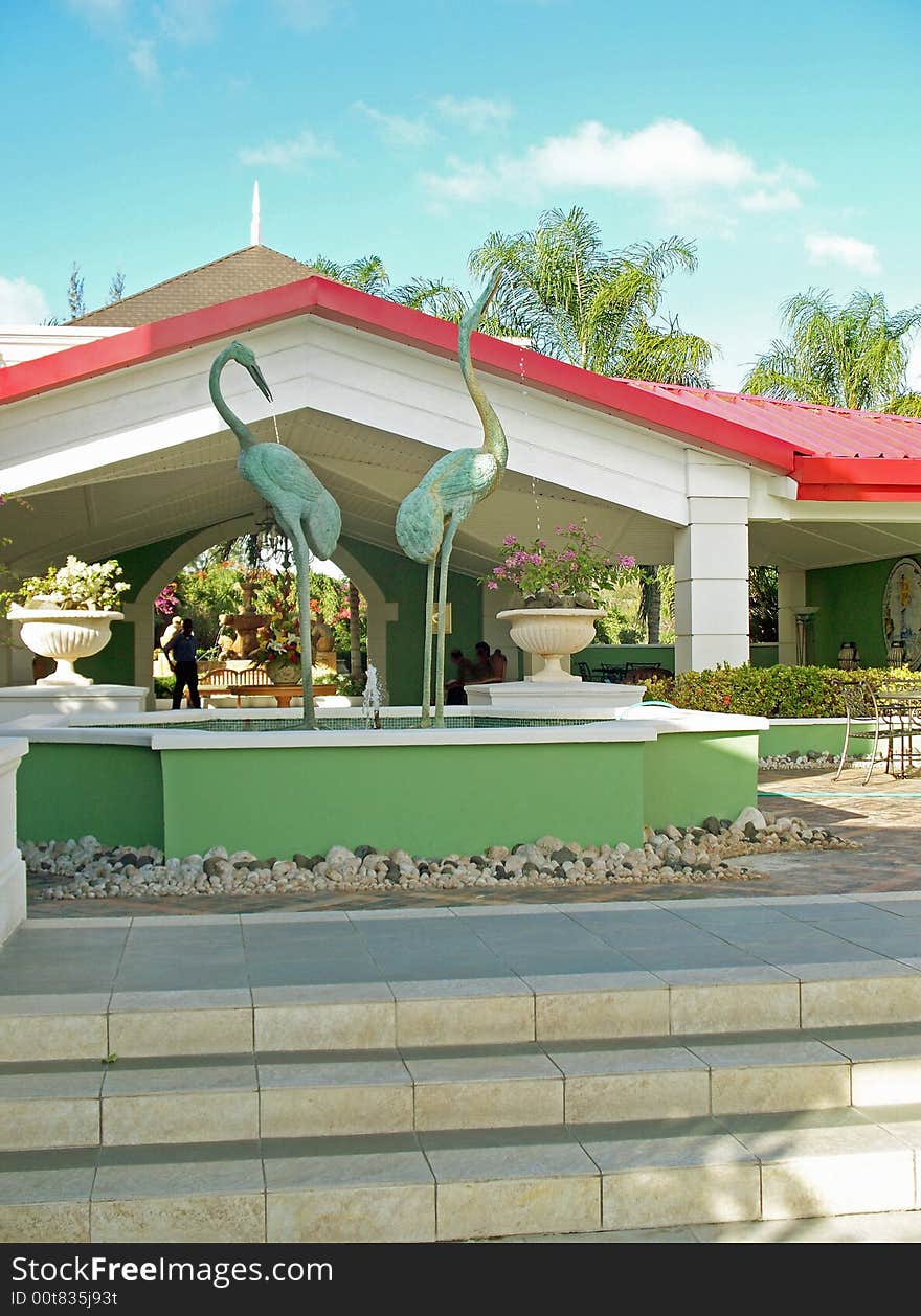 Fountain of cranes at sands grande resort in st. lucia  west indies and eastern caribbean at rodney bay. Fountain of cranes at sands grande resort in st. lucia  west indies and eastern caribbean at rodney bay