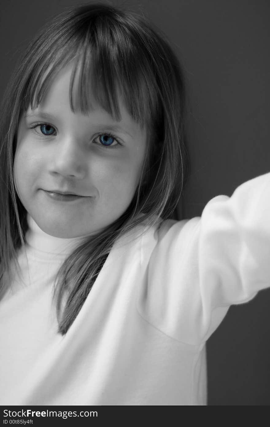 Little girl smiling at the camera in black and white. Little girl smiling at the camera in black and white