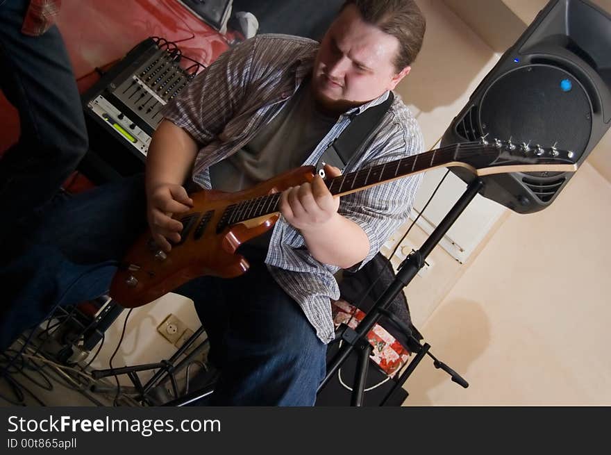 The musician with a guitar. Concert of group StockDog in club the Woman-ljuba. Rostov-on-Don. Russia