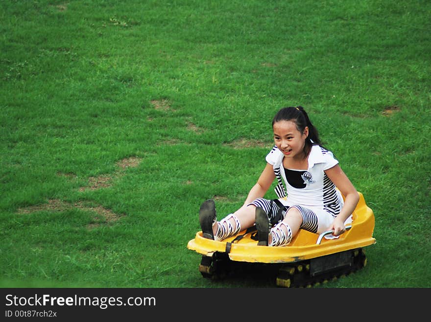 An girl doing Slippery grass movement