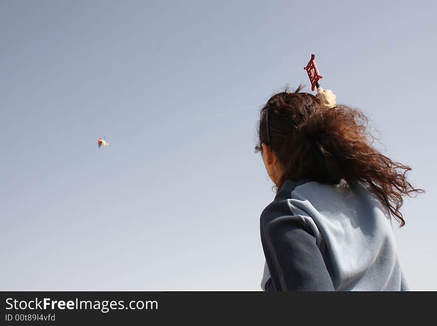 Young woman with kite