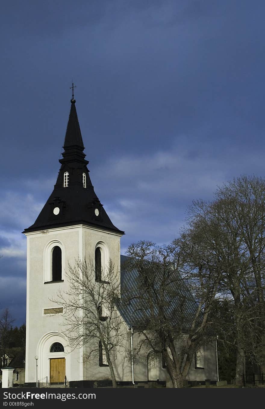 White Church and dark clouds