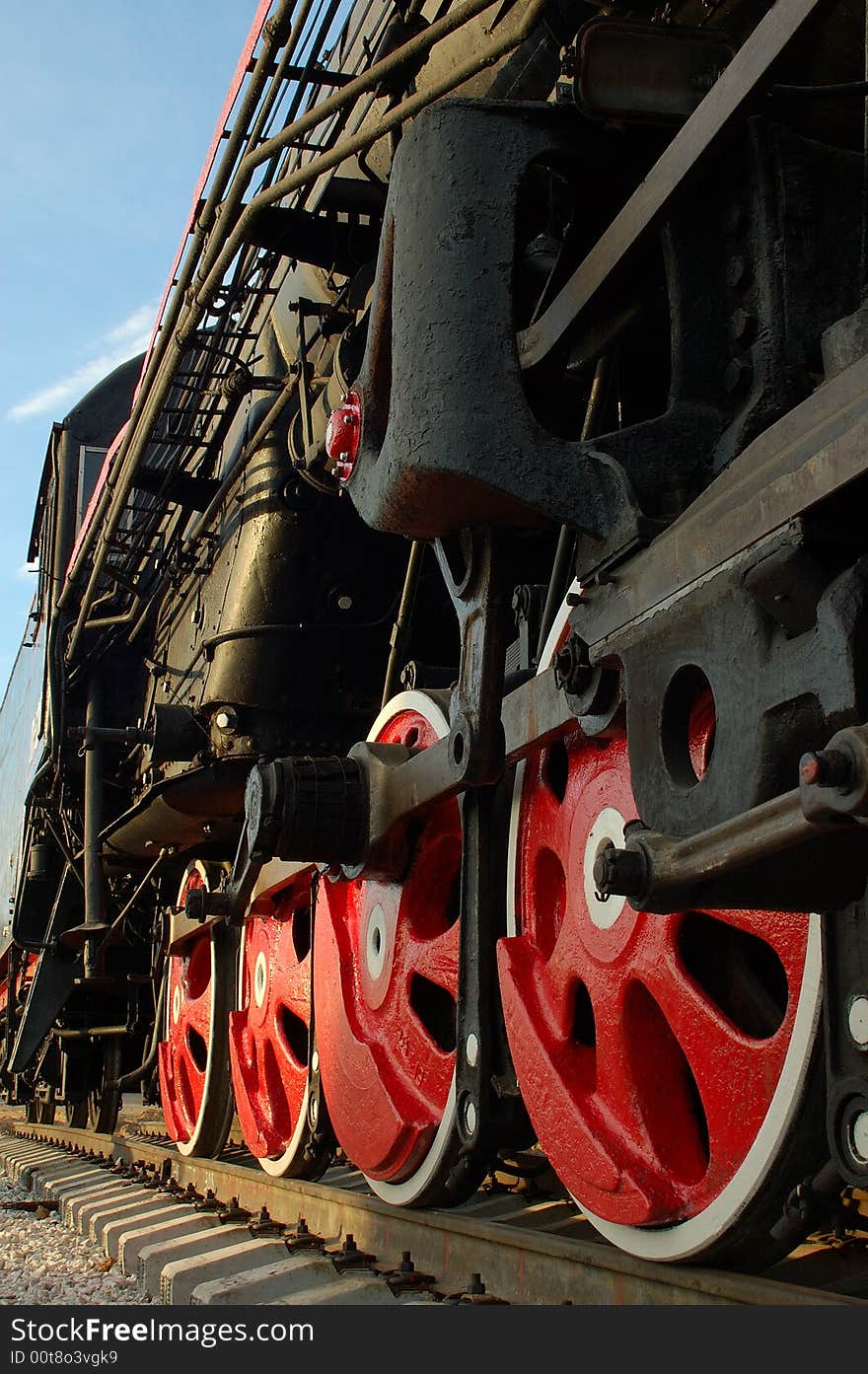 Wheels of a steam locomotive close up