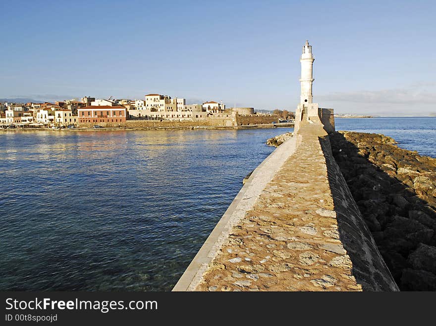 Light tower in the harbour of chania