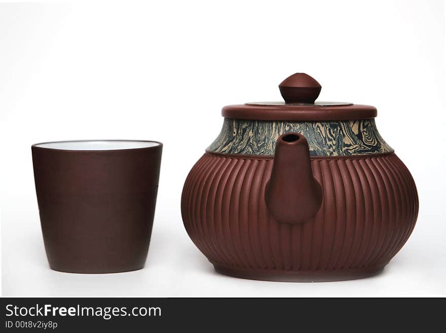 Traditional japan teapot with a cup