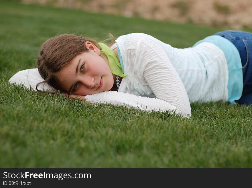 Young and happy girl is enjoying herself outdoors. Young and happy girl is enjoying herself outdoors