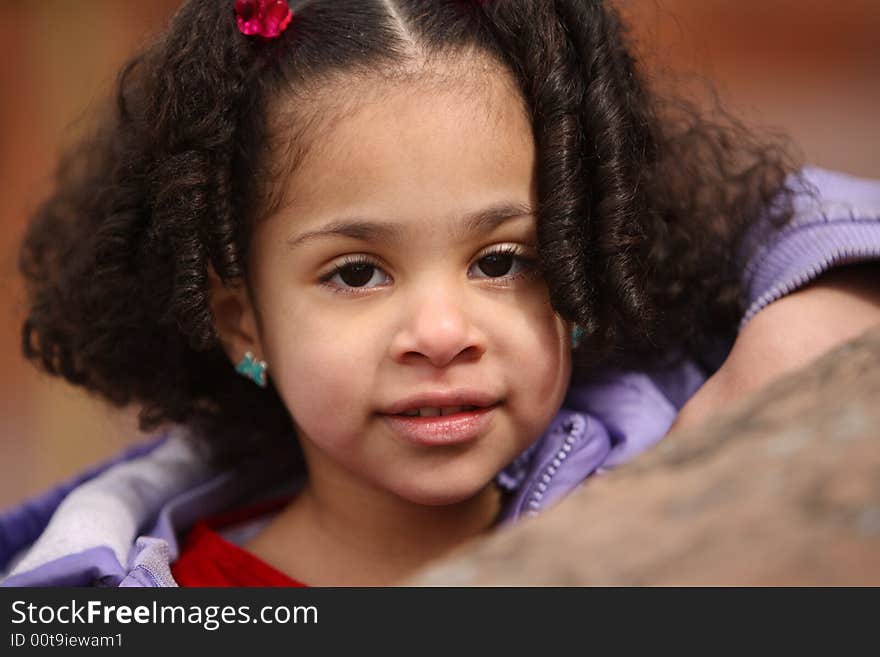 Young beautiful multiracial girl with afro hairstyle. Young beautiful multiracial girl with afro hairstyle