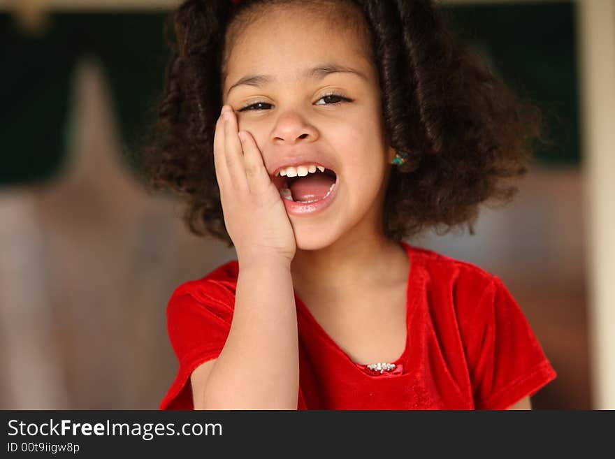 Young beautiful multiracial girl with afro hairstyle. Young beautiful multiracial girl with afro hairstyle