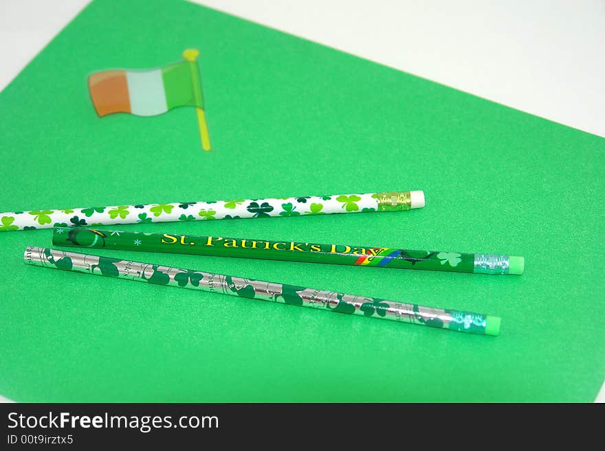 A picture of pencils and folders representing St. Patrick's Day. A picture of pencils and folders representing St. Patrick's Day