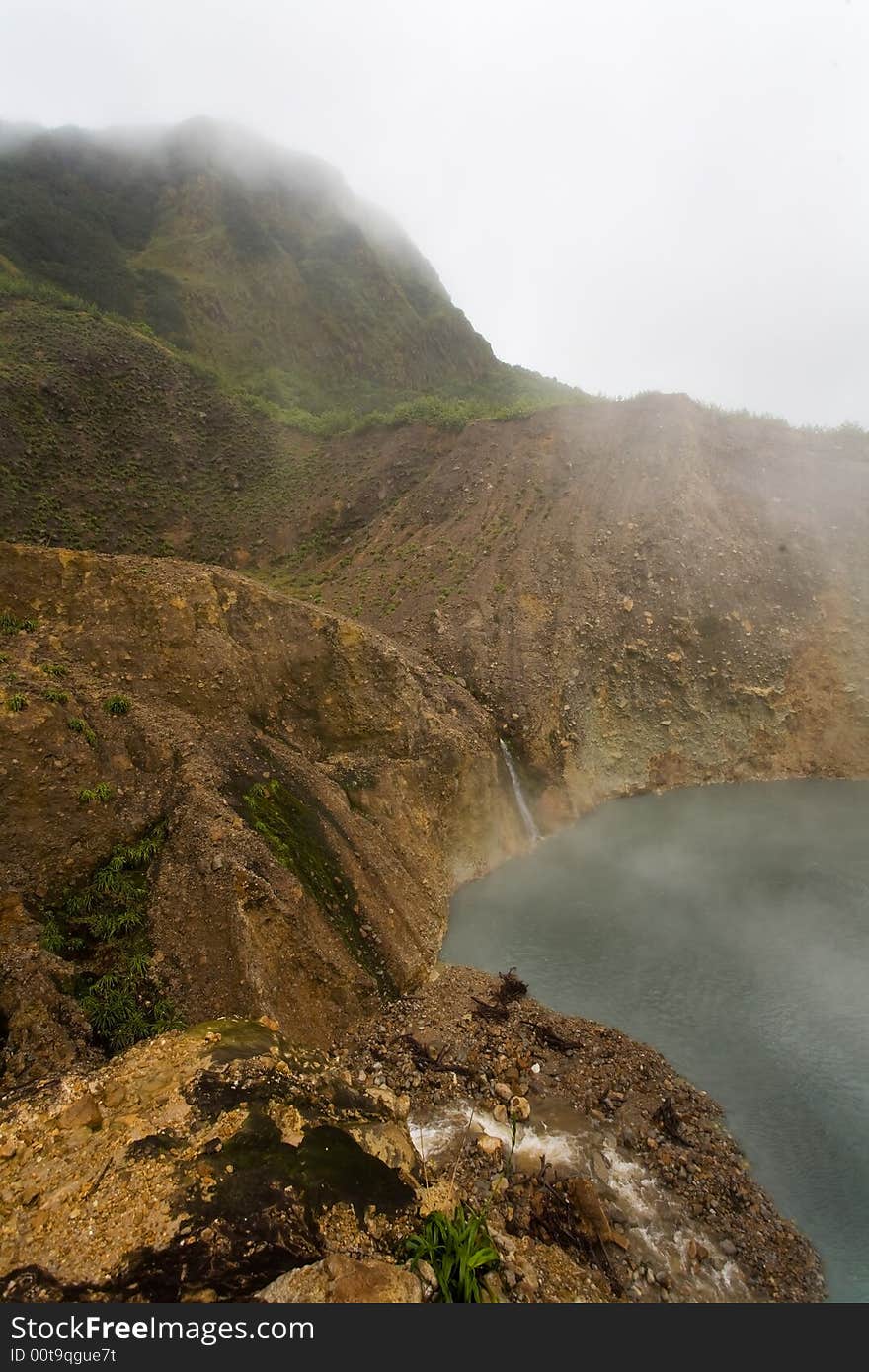 Remote boiling lake on tropical island. Remote boiling lake on tropical island