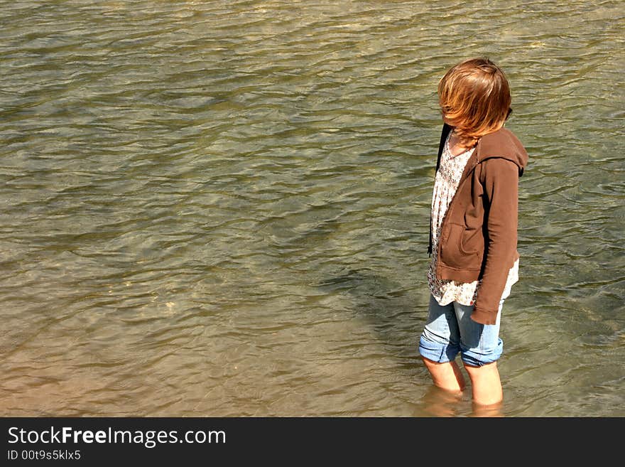 A teenage girl going for a cool walk on a warm summer day. A teenage girl going for a cool walk on a warm summer day