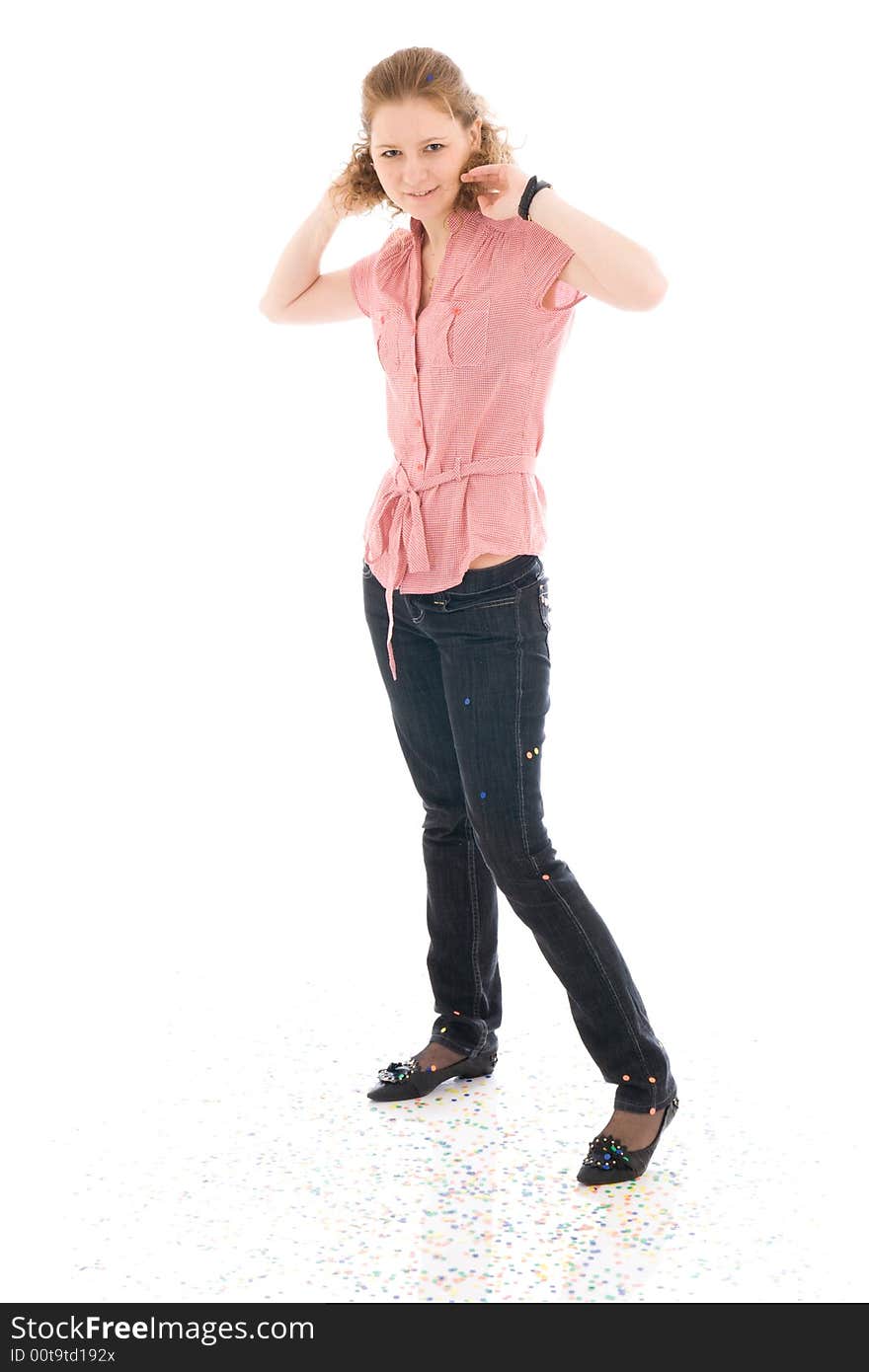 The young beautiful girl with the confetti isolated on a white background. The young beautiful girl with the confetti isolated on a white background