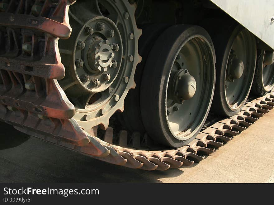 Detail of the tracks on a retired military tank. Detail of the tracks on a retired military tank