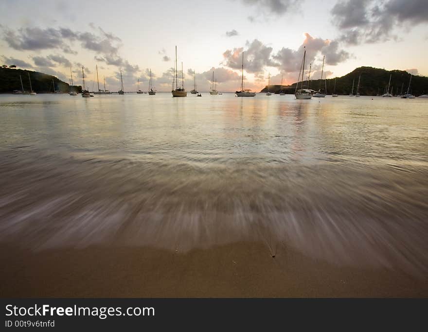 Sunset light over anchored boats on tropical island of Antigua. Sunset light over anchored boats on tropical island of Antigua