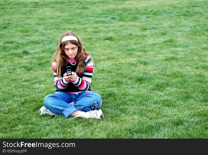 Young Girl And Cellphone