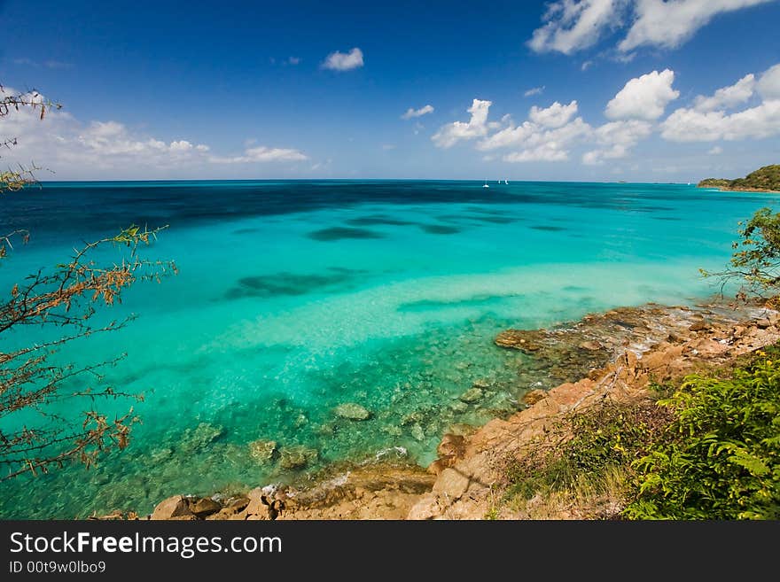 Secluded beach and turquoise waters on tropical island. Secluded beach and turquoise waters on tropical island