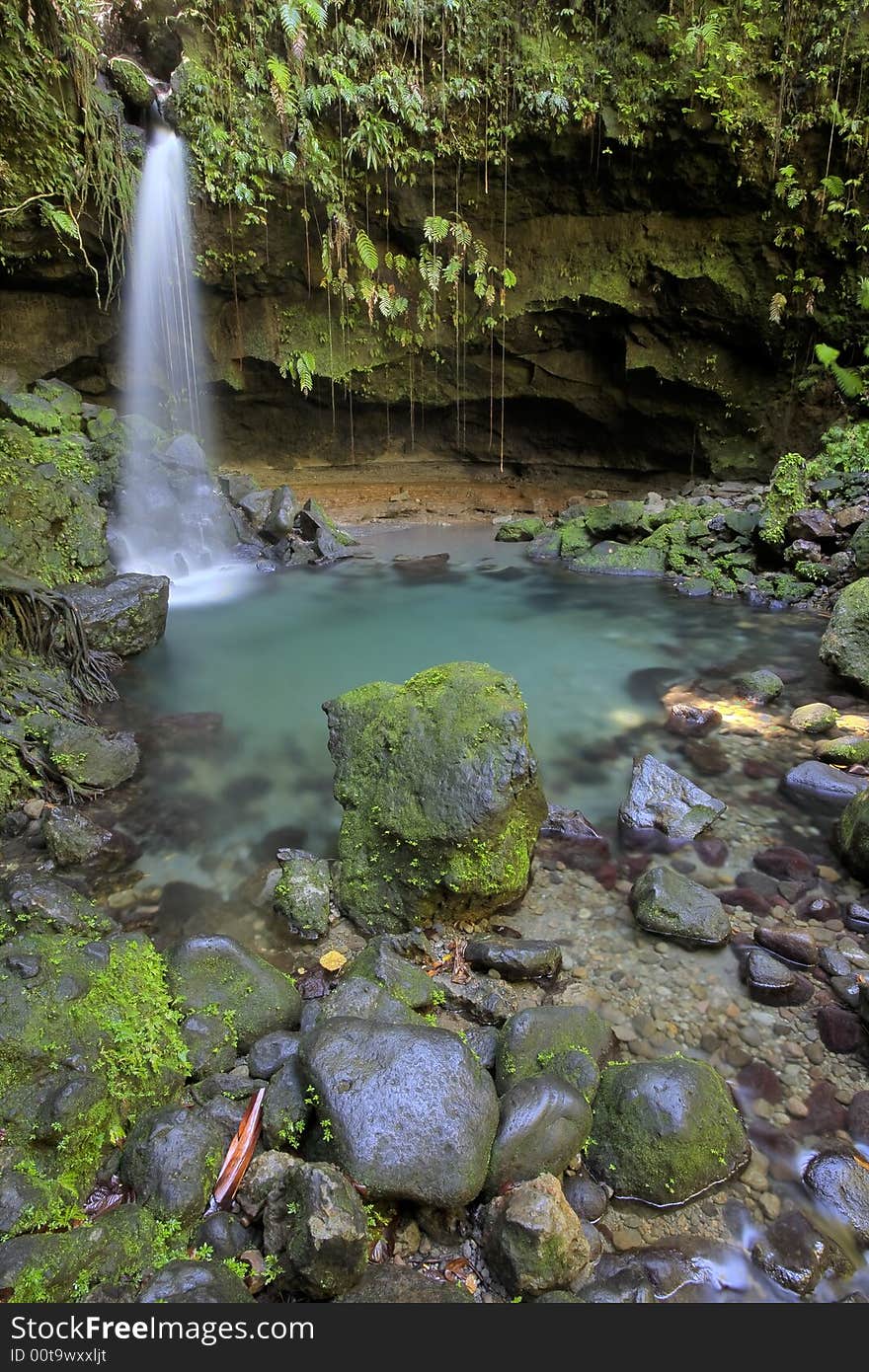 Spectacular waterfall with Emerald Pool at bottom. Spectacular waterfall with Emerald Pool at bottom