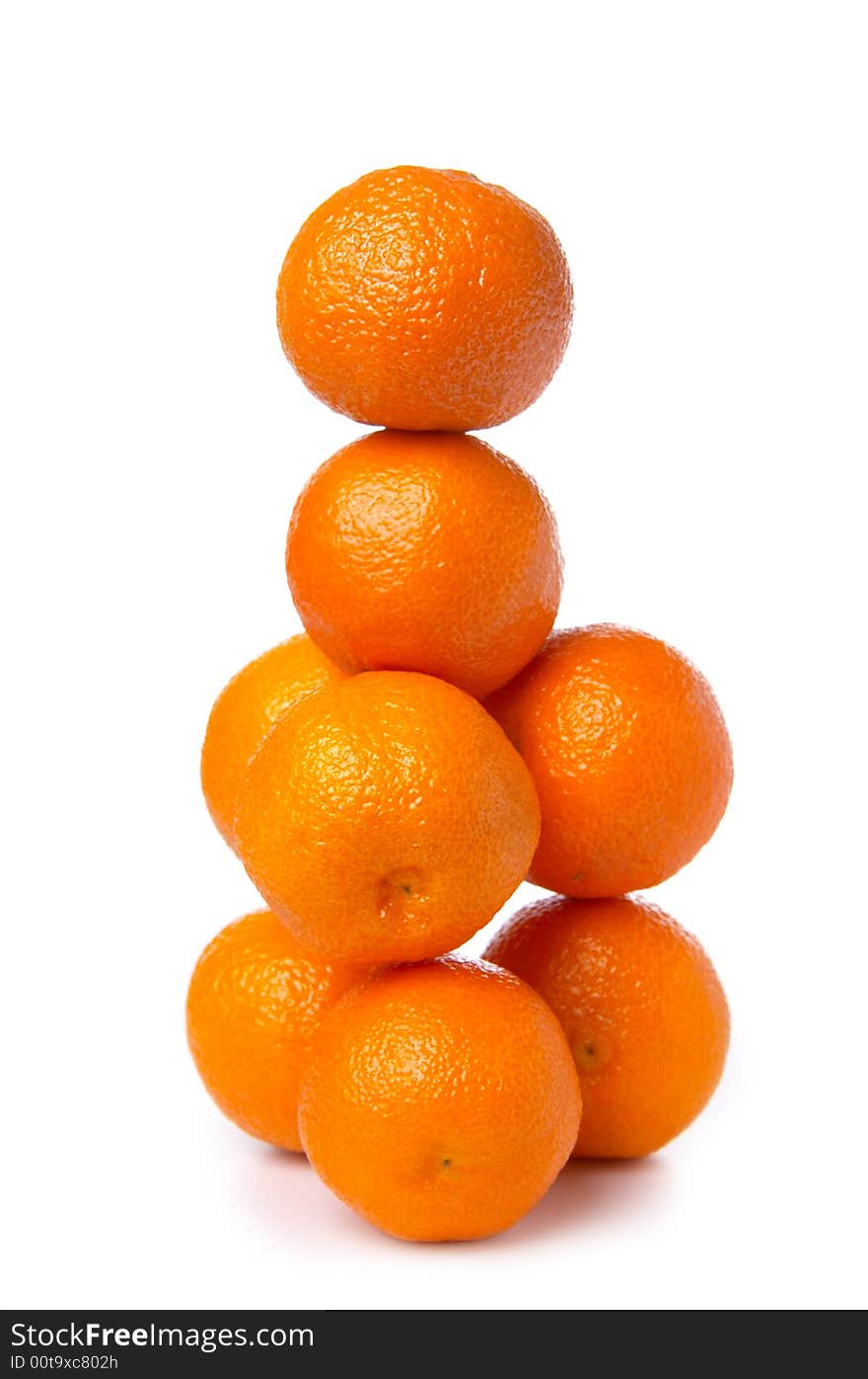 Pyramid from tangerines. A vitamin pyramid.
