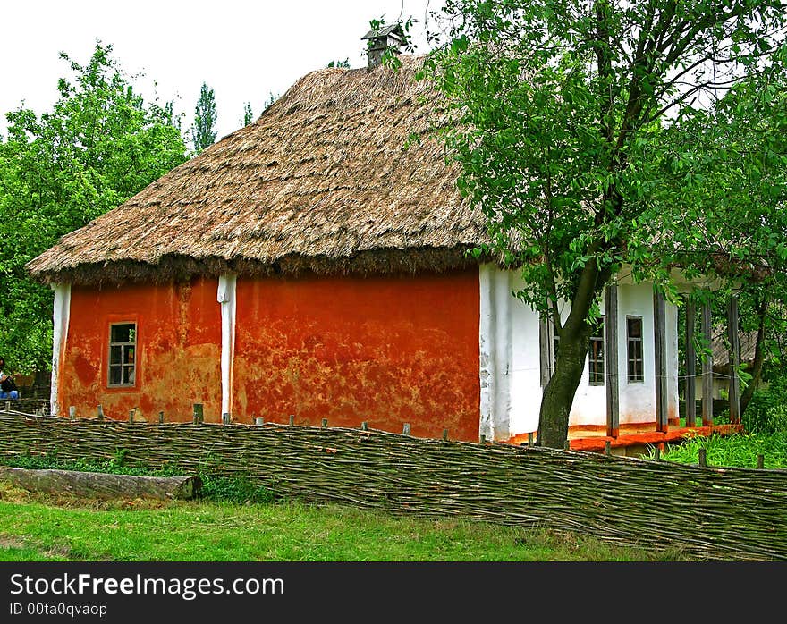 Country house in Pirogovo village (Ukraine) with red wall. Country house in Pirogovo village (Ukraine) with red wall