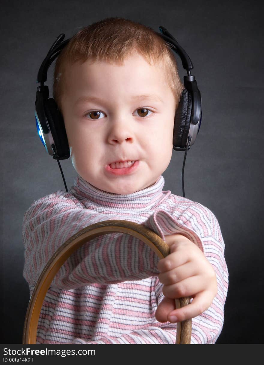 The Child With Ear-phones