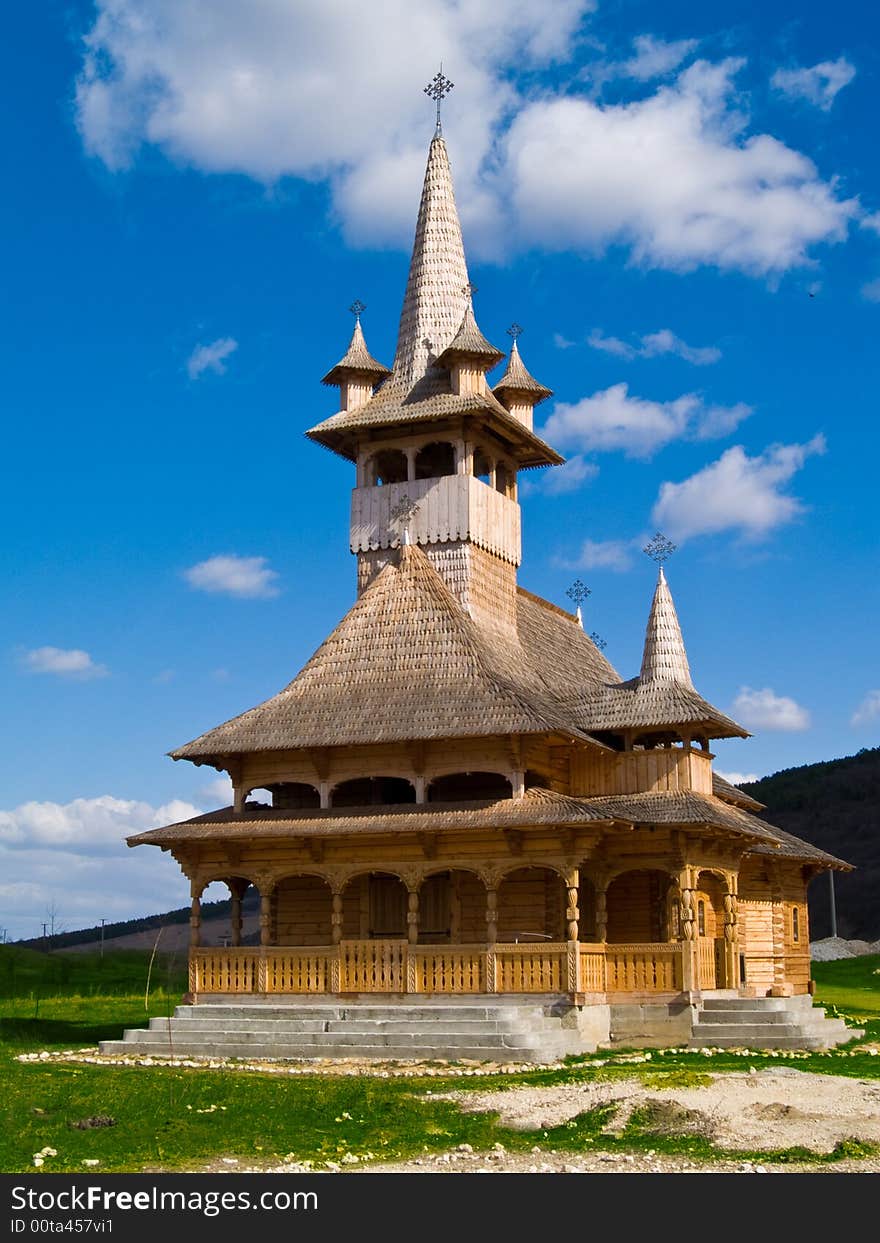 Wood church in romania sunny day green grass