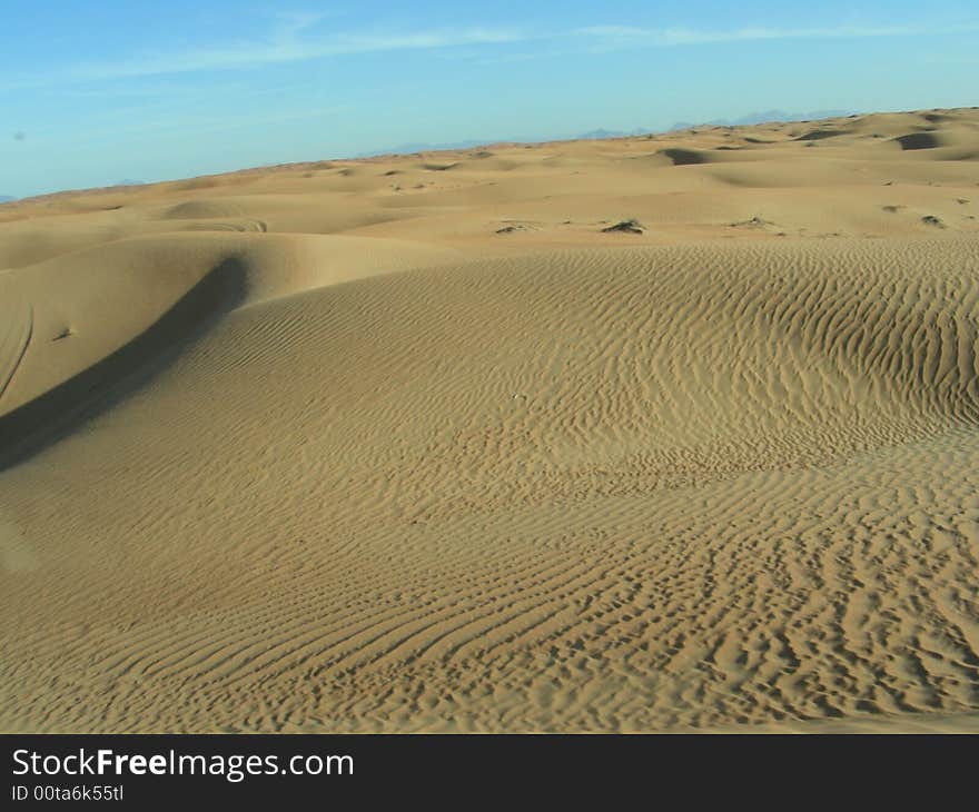 A panoramic view of sand in the desert