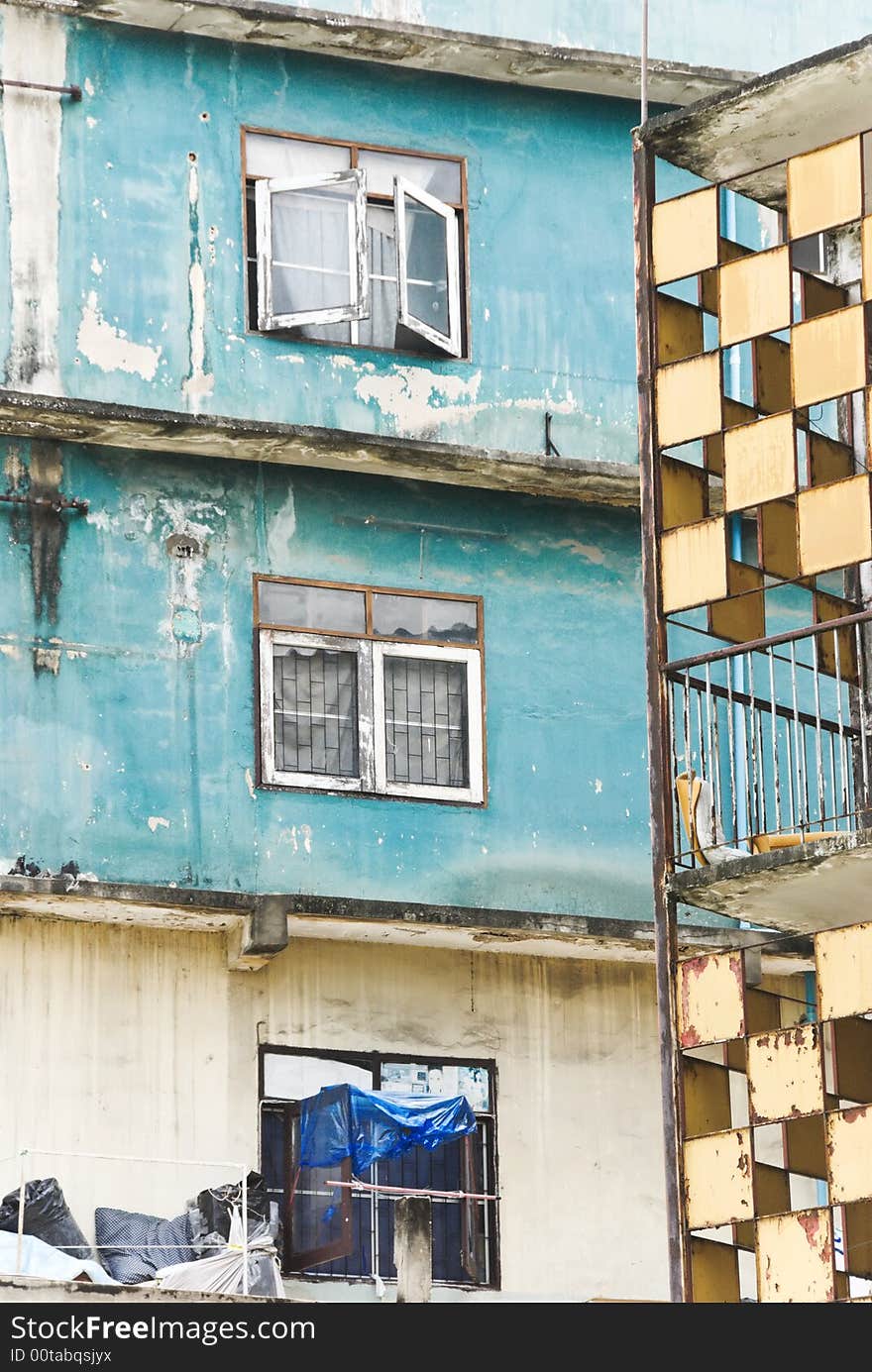 Decayed house with colorful walls