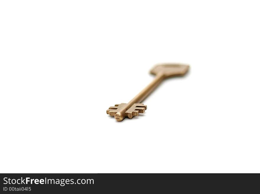 Yellow, old key on white background, isolated