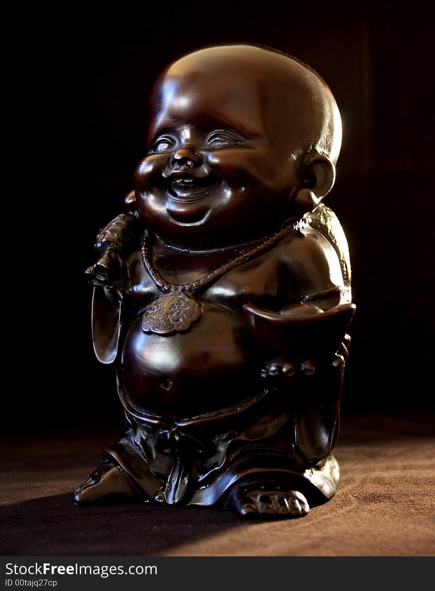 Smiling Buddha brings light to give you some happiness. Smiling Buddha brings light to give you some happiness