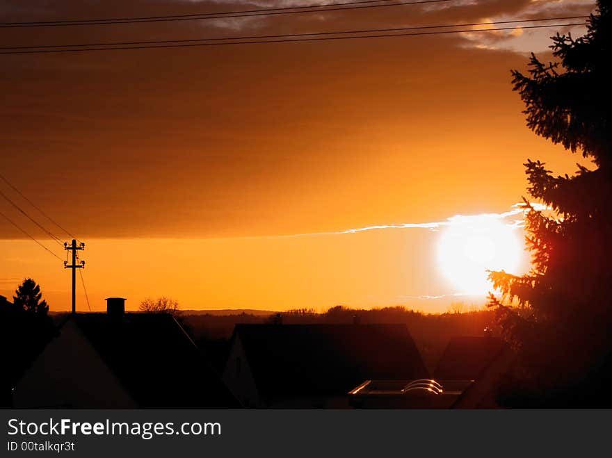 Sunset over little village